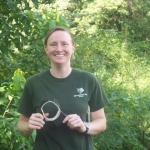Zookeeper Jessica in Thailand working with wild dhole