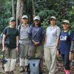 Setting out with the field team, wearing leech-preventing knee-high socks.