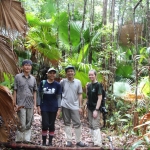 Hiking in the forest of Endau-Rompin with WCS-Malaysia staff, wearing leech-proof socks.