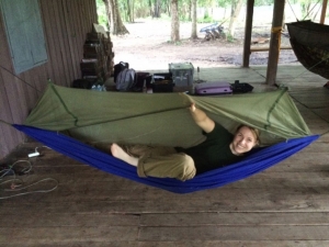 Sleeping in a hammock complete with mosquito net