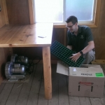 Aquarist Ben Minerich beginning installation of the mussel system mechanical equipment.