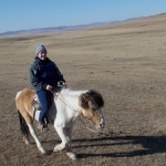 Taylor riding one of the domestic Mongolian horses.