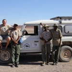 Minnesota Zoo's Jeff Muntifering with several Rhino Rangers after a successful patrol.